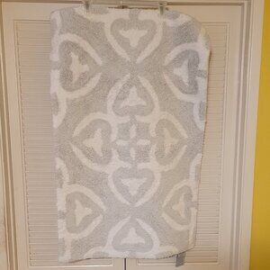 2 Rugs Light Colored with Pattern.